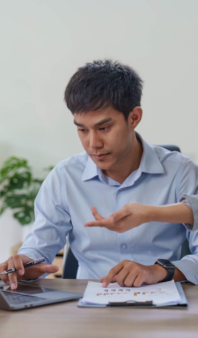 financial-analyst-analyzes-business-people-investment-consultant-analyzing-company-financial-report-1.jpg